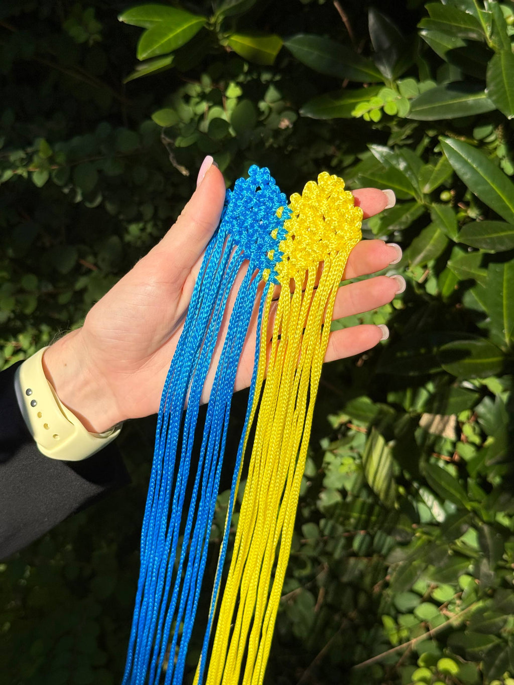 Ukrainian Flag Fringe Brooch — blue and yellow held in hand