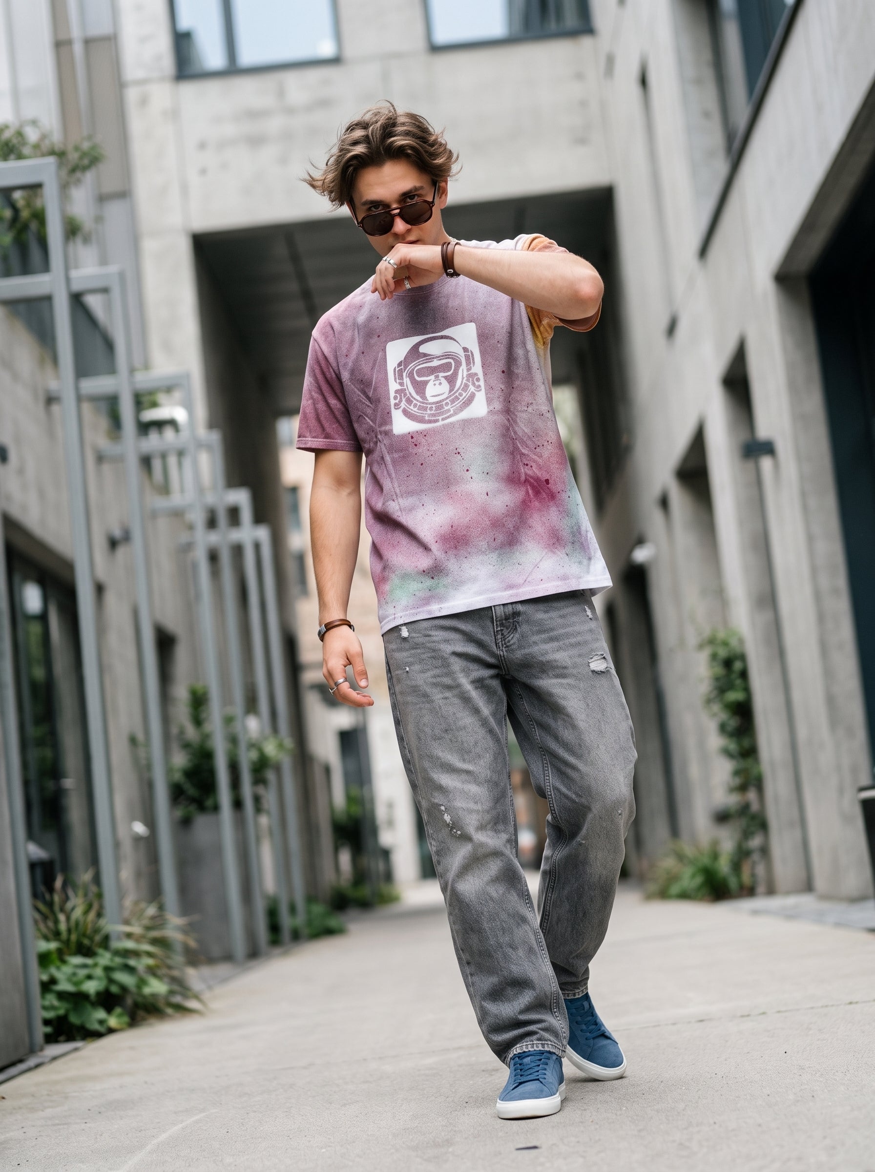 Astronaut Acid Wash Tee — handmade pink tie-dye t-shirt with astronaut graphic, worn on urban street