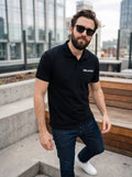 RELAXXX Polo — black polo shirt with RELAXXX chest print