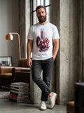 I Love You Tee — white t-shirt with bold I Love You graphic print worn by bearded man in loft