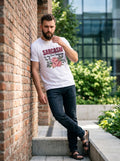 Sarcasm Is My Love Language Tee — white t-shirt with floral sarcasm print worn by man on brick wall street
