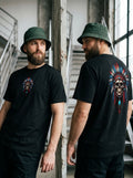 Chief Skull Tee — black t-shirt with colourful skull in Native American headdress, small on chest and large on back