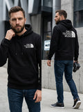 Crescent Hoodie — black hoodie with white crescent moon and star, small on chest and large on back