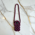 Burgundy Crochet Phone Bag on marble