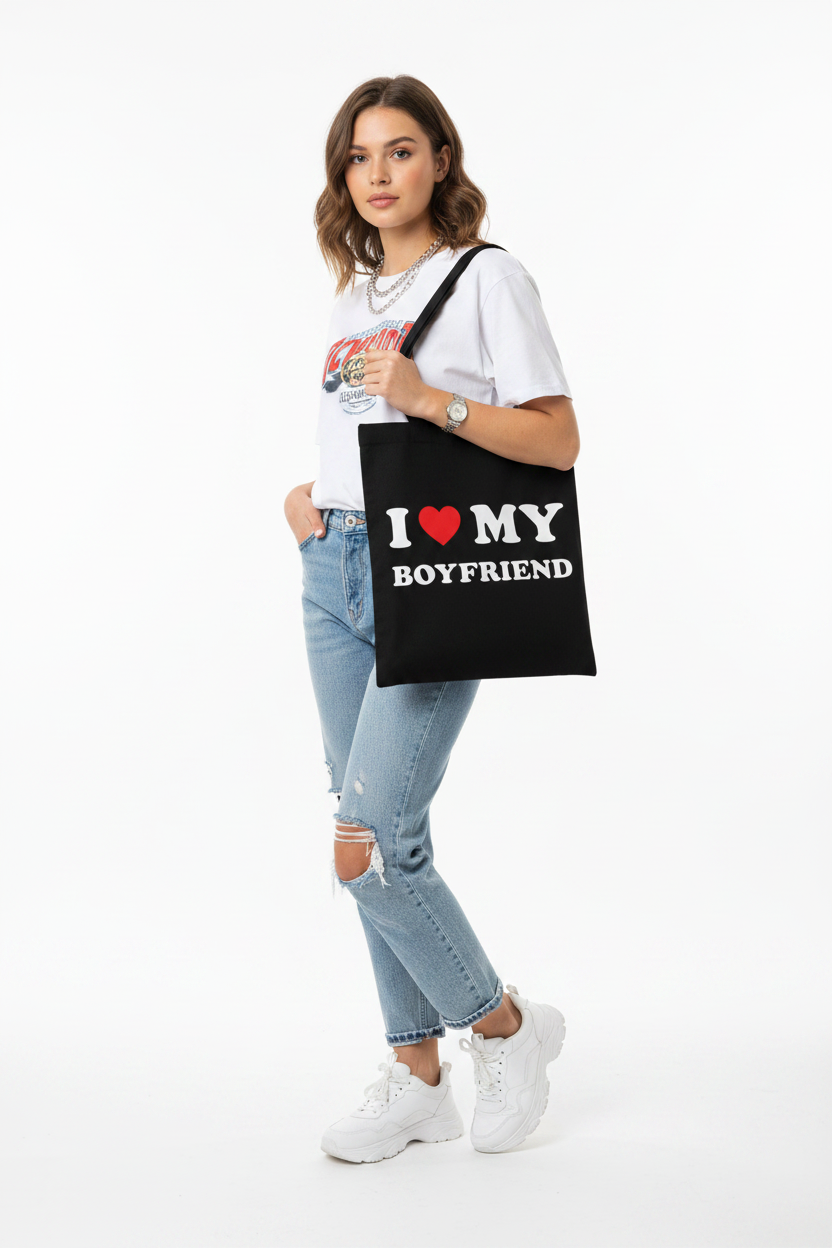 I Love My Boyfriend Tote Bag — worn on shoulder by stylish young woman, street style