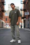 ID Ski Mask Tee worn by man on urban street